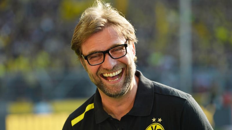 Borussia Dortmund head coach Jürgen Klopp laughs prior to the recent Bundesliga match against Bayern Munich in Dortmund. Photograph; Odd Andersen/AFP Photo/Getty Images