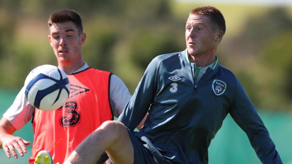 James McCarthy (right) hard at work during yesterday’s Republic of Ireland squad training session at  Gannon Park in Malahide, Co Dublin. Photograph: Lorraine O’Sullivan/Inpho