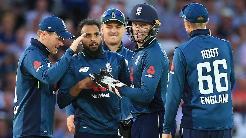 England’s Adil Rashid (centre) celebrates victory with teammates after  his side inflicting a world record 481 for six on Australia’s hapless bowlers. Photograph: Lindsey Parnaby/AFP/Getty Images