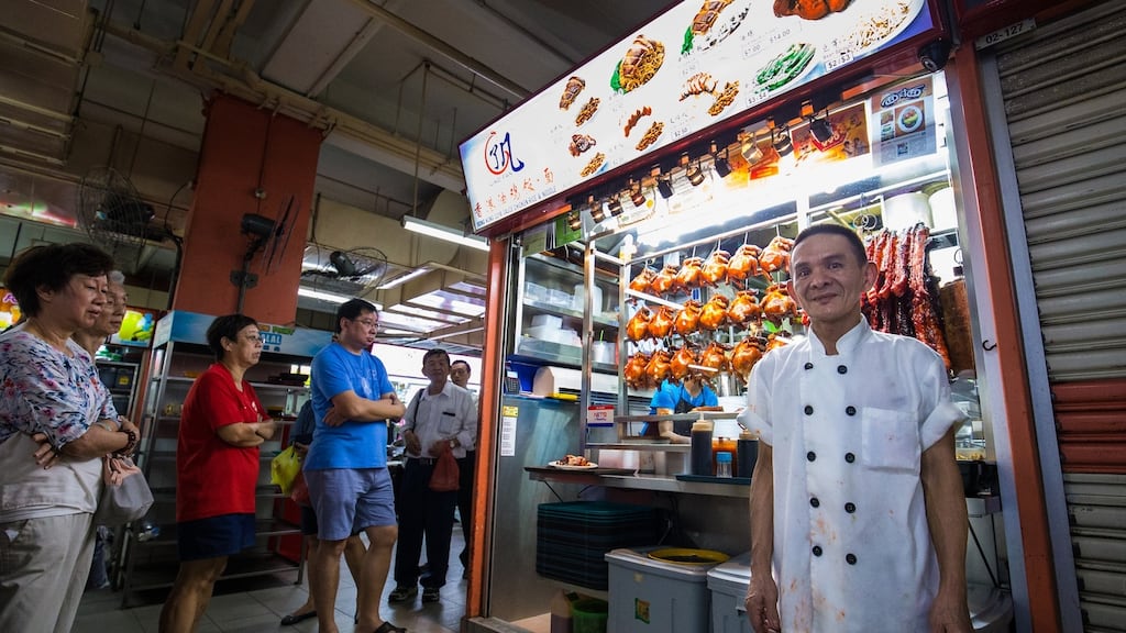 Chan Hong Meng  at his Hong Kong Chicken Rice and Noodle stall  in Singapore