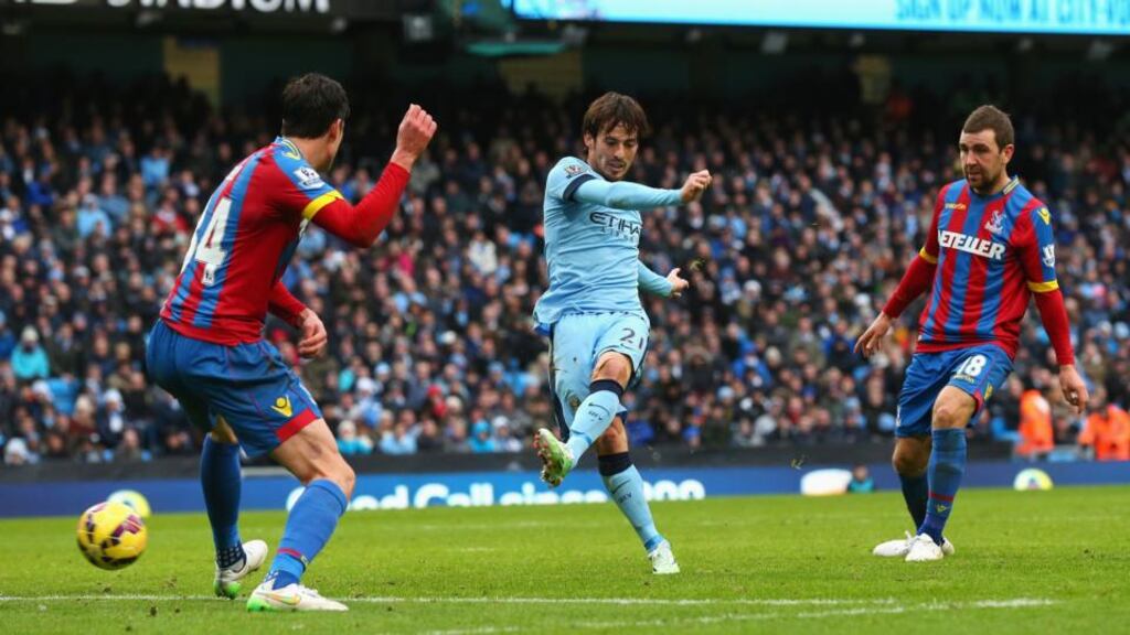 David Silva scores his and Manchester City’s second goal in the Premier League match against Crystal Palace at Etihad Stadium. Photograph: Alex Livesey/Getty Images