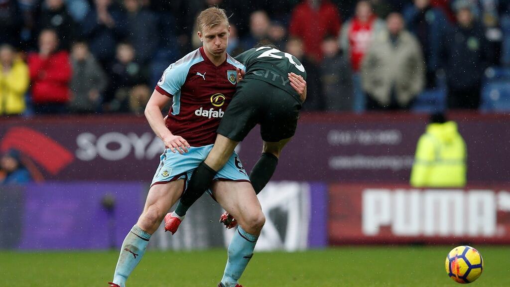 Burnley defender Ben Mee stops Manchester City’s Bernardo Silva during the Premier League game at Turf Moor. Photograph: Andrew Yates/Reuters