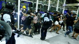 Chaotic scenes at Hong Kong airport as protesters clash with police