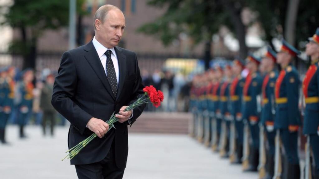 Russian president Vladimir Putin attends a wreath-laying ceremony to commemorate the 73th anniversary of Germany’s invasion of the Soviet Union, at the tomb of the unknown soldier at the Kremlin walls in Moscow yesterday. Photograph: EPA/Alexey Druzhinin/Ria Novosti