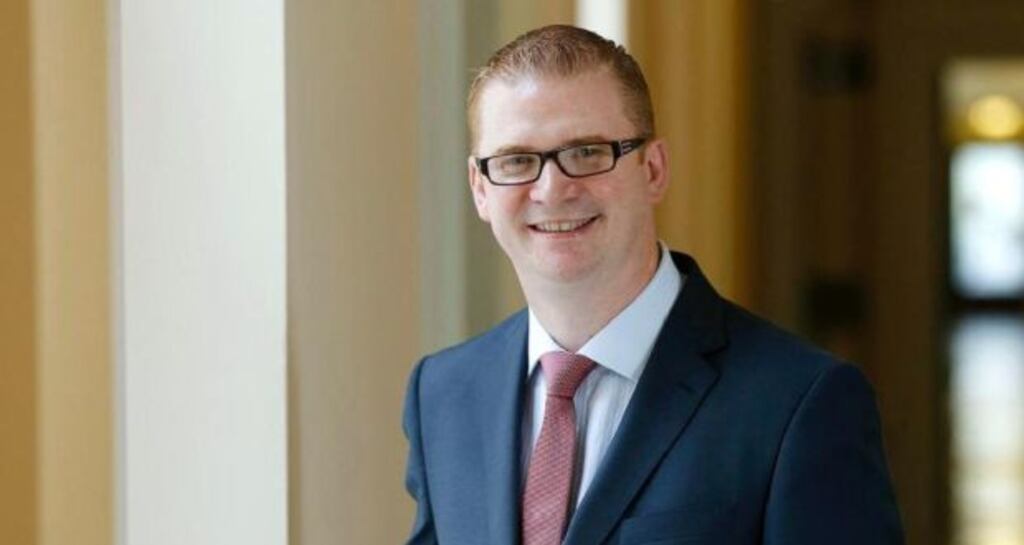 DUP Minister for Finance Simon Hamilton wants less politicians and civil servants operating at Stormont. Photograph: Kelvin Boyes/Press Eye/PA Wire