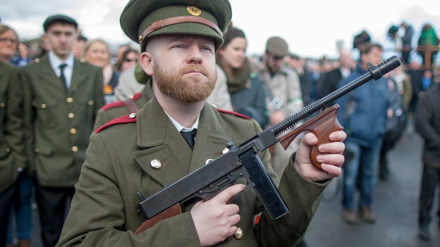 A man dressed in period uniform of the 1916 Easter Rising with a replica Tommy gun at the Sinn Féin 1916 commemoration. Photograph: Liam McBurney/PA Wire