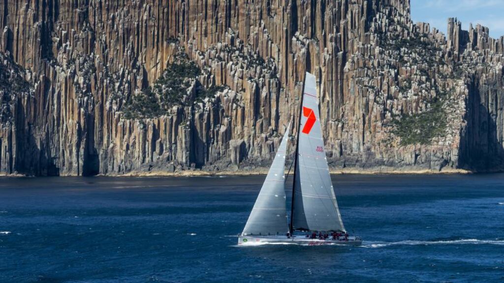 Wild Oats XI, the seven-time line honours winner of the Rolex Sydney Hobart race passes the ‘Organ Pipes’ cliff face off the New South Wales coast. Photograph: Carlo Borlenghi/Rolex