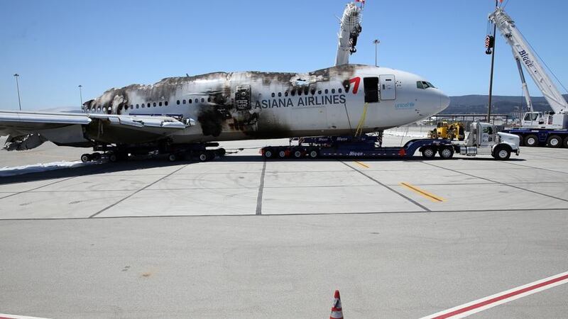 The wrecked fuselage of Asiana Airlines flght 214 sits in a storage area at San Francisco International Airport. Photograph: Justin Sullivan/Getty Images.