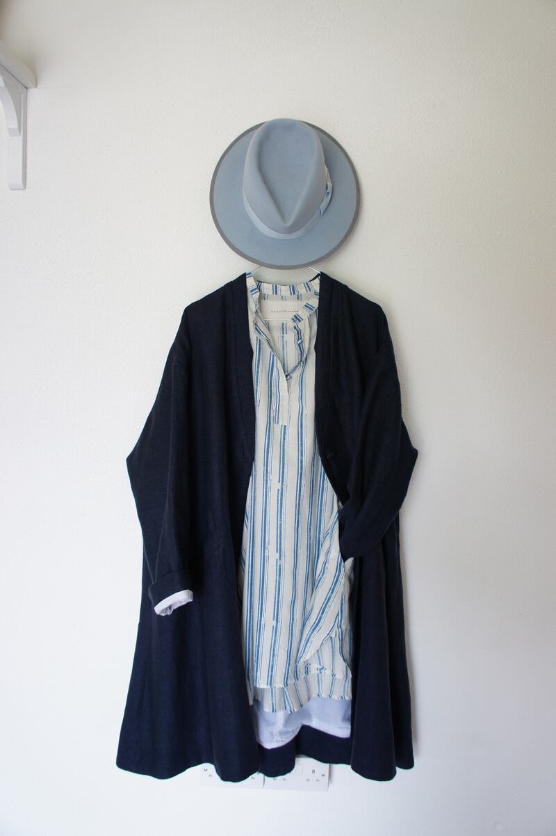 Navy linen coat Û580, block print indigo shirt Û310, Mylo light blue felt hat Û260.
