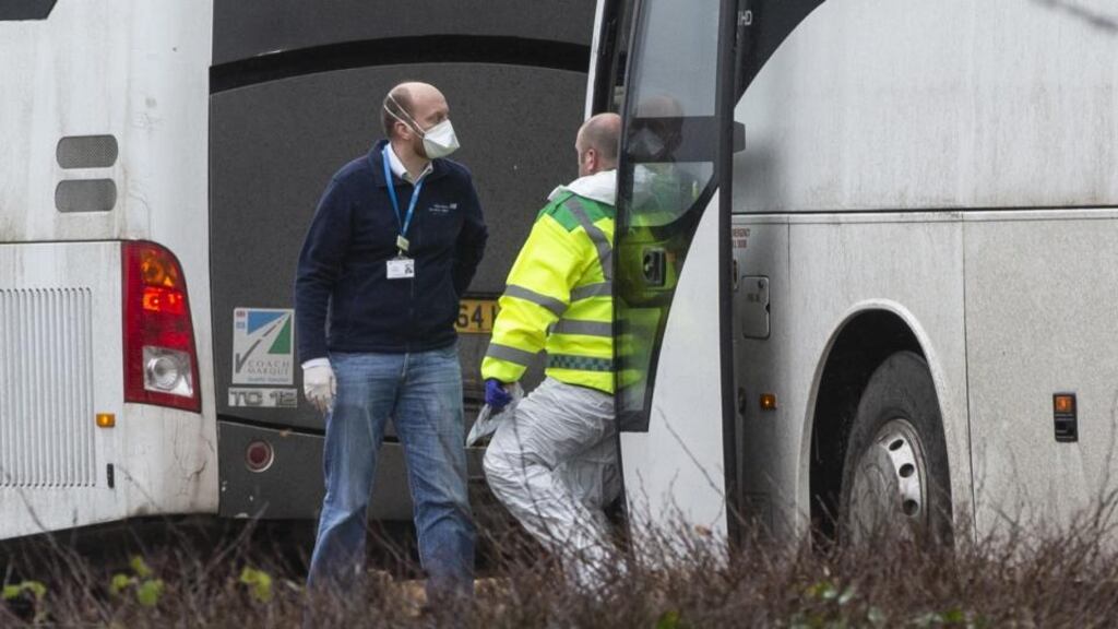 Coaches carrying British nationals flown out of  the Chinese city of Wuhan arrive at   Kents Hill Park where they are due to remain in quarantine for 14 days. Photograph: Getty