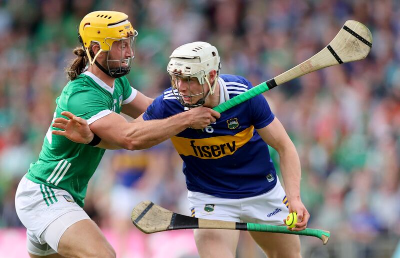 Limerick’s Tom Morrissey and Bryan O'Mara of Tipperary in action in Semple Stadium. Photograph: James Crombie/Inpho