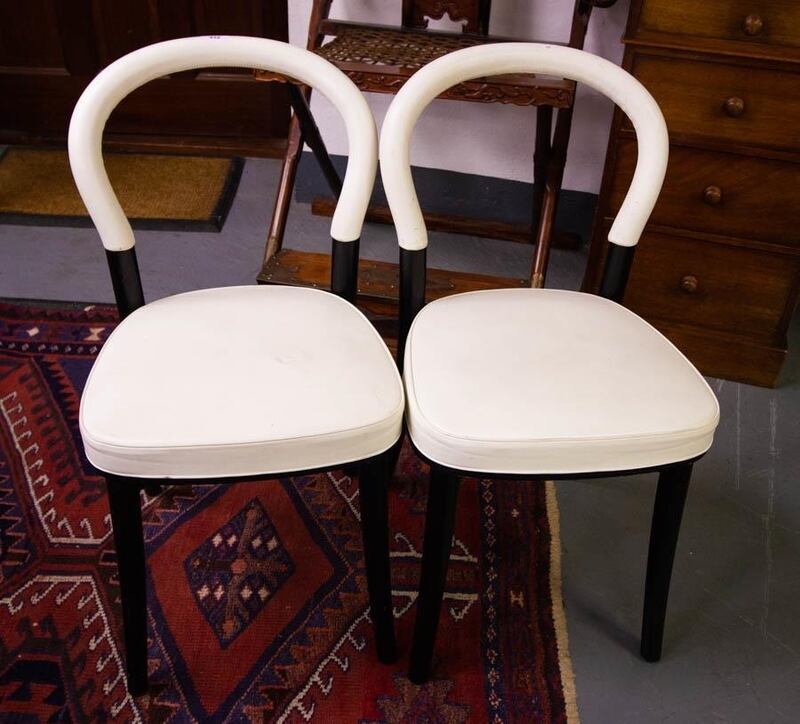 Four Cassina Goteborg white leather dining chairs (lot 432, €1,800-€2,000, Keighery's)