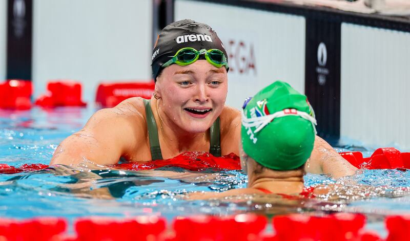 Ireland’s Mona McSharry celebrates winning a bronze medal with gold medal winner Tatjana Smith of South Africa. Photograph: James Crombie/Inpho