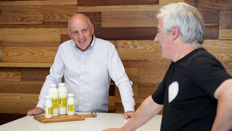 Sean McGloin and business partner John Brennan check out their finished product, Natural Kefir, which comes in two sizes