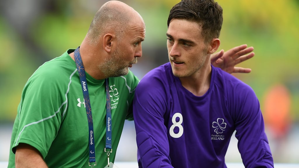 Ireland coach Gerard Glynn talks to goalkeeper Aaron Tier after the defeat to Ukraine in the men’s 7-a-side football preliminaries at Deodoro Stadium in Rio de Janeiro. Photograph: Diarmuid Greene/Sportsfile
