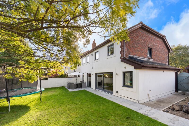 The rear garden has side access