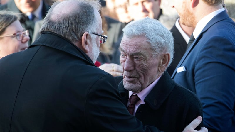 Marian Finucane’s husband, John Clarke, is consoled  at her funeral, which took place at St Brigid’s Church, Kill, Co Kildare. Photograph: Colin Keegan/Collins