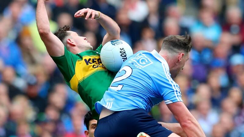 Kerry’s Jack Savage with Dublin’s Cian O’Sullivan and Philly McMahon. Photograph: James Crombie/Inpho
