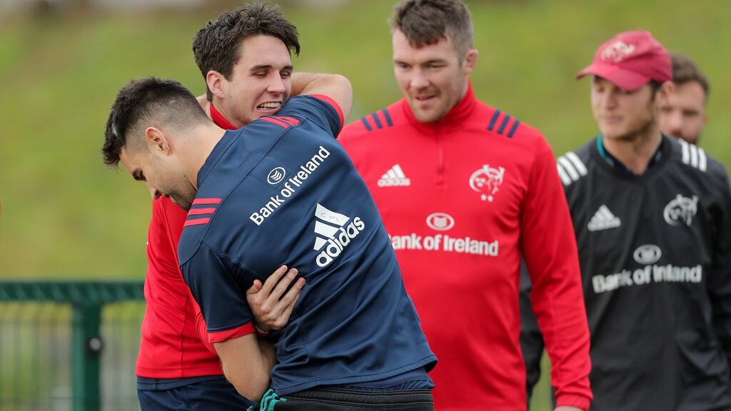 Joey Carbery and Conor Murray during Munster training. Photograph: Laszlo Geczo/Inpho