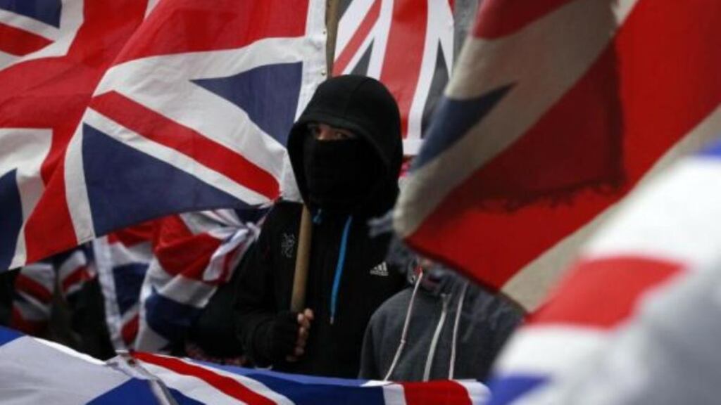 Loyalist protesters demonstrate against restrictions on flying the union flag from Belfast City Hall in central Belfast last January 2013. Photograph: Reuters