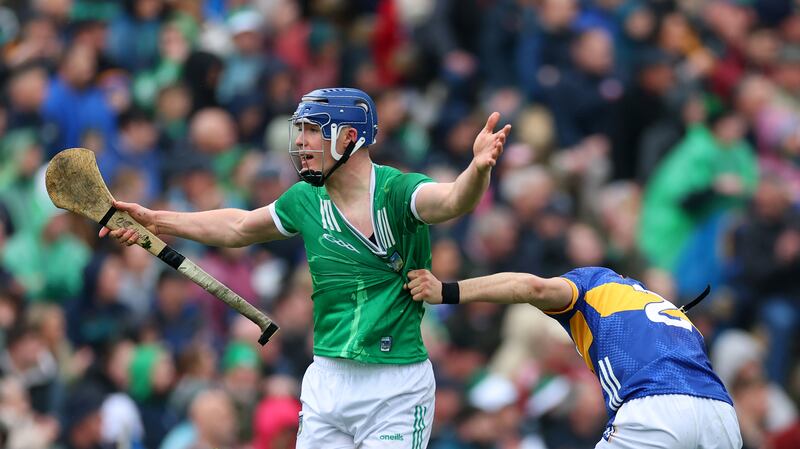 Limerick’s Shane O'Brien and Robert Doyle of Tipperary  in the first round of the Munster hurling championship. Photograph: James Crombie