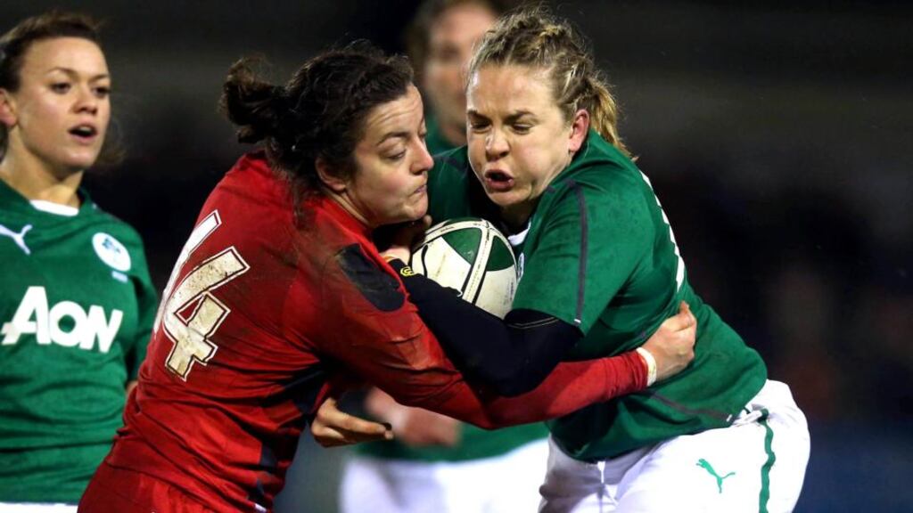 Niamh Briggs (with ball), so important to Ireland’s game plan both as a strike runner and for her peerless kicking ability, has been given the all-cllear to face Italy this evening. Photograph: Donall Farmer/Inpho