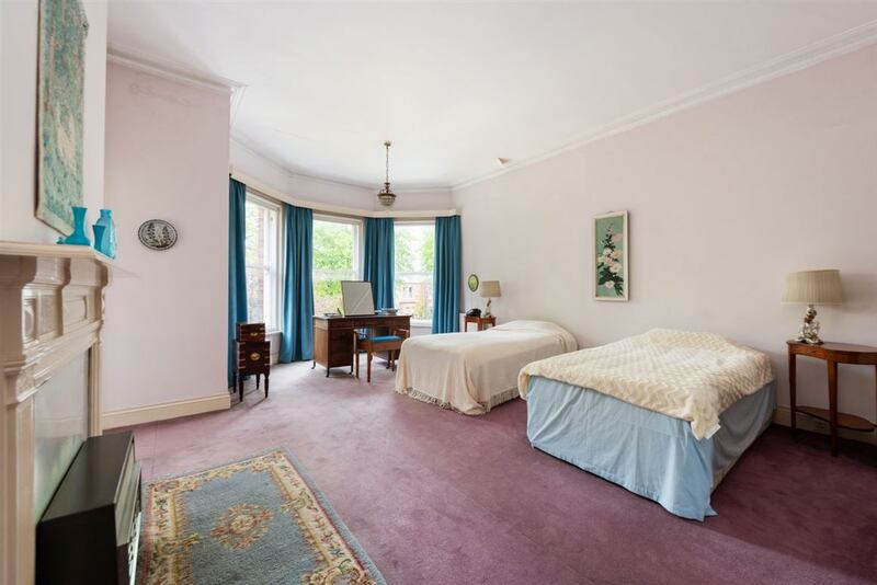 One of the six bedrooms.