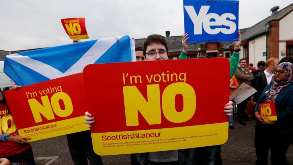 “Only two years ago, Scottish nationalists were seriously divided on defence policy”. Above, opposing supporters wait for the leader of Britain’s Labour Party, Ed Miliband, during a campaign visit. Photograph:  Reuters