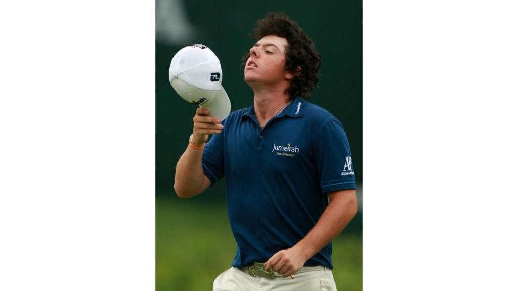 Rory McIlroy breathes a sigh of relief after escaping with a par on the ninth green (his last) yesterday evening. The 21-year-old will resume three behind leader Matt Kuchar. Photograph: Andrew Redington/Getty Images