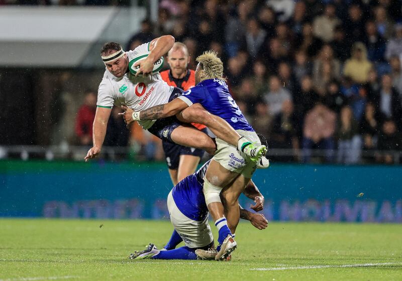 Ireland’s Rob Herring with Lima Sopoaga and Jonathan Taumateine of Samoa. Photograph: Dan Sheridan/Inpho
