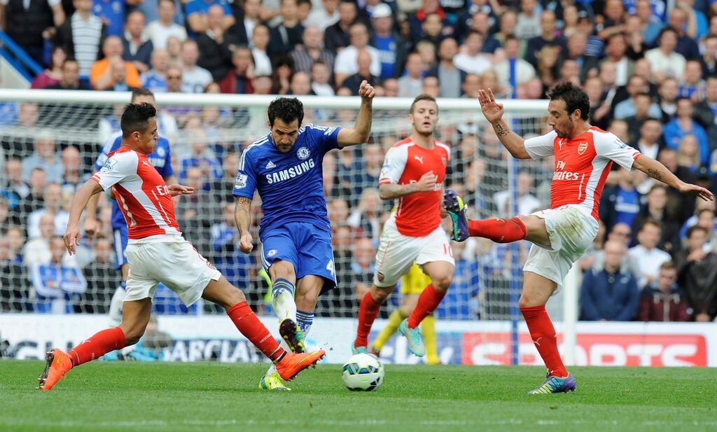 Cesc Fabregas in action during the match between Chelsea and Arsenal at Stamford Bridge yesterday. Photograph: Facundo Arrizabalaga/EPA