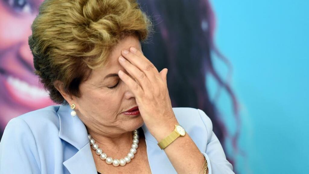 President Dilma Rousseff: Hundreds of thousands are expected to take to the streets on Sunday to demand her impeachment. Photograph: Evaristo Sa/AFP/Getty Images