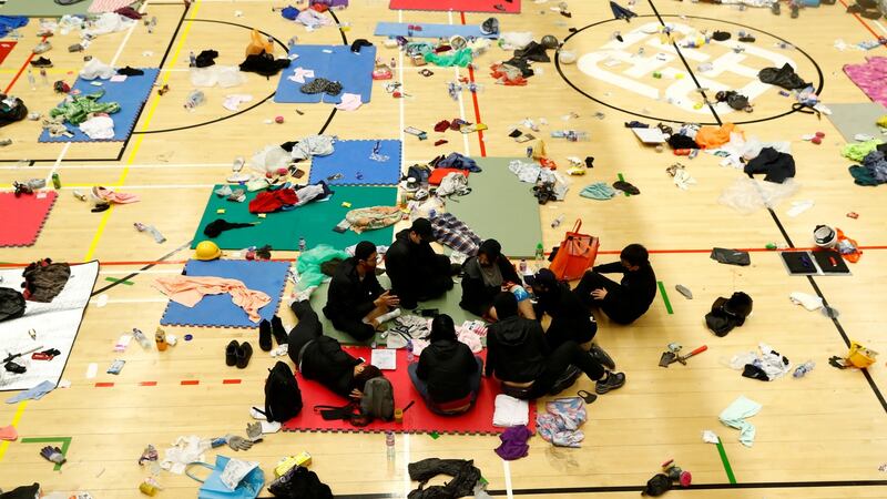 Anti-government protesters rest in the gymnasium at the besieged Hong Kong Polytechnic University. Photograph: Reuters