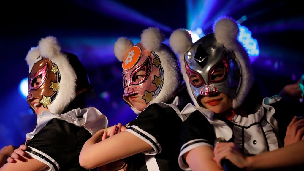 Members of Japan’s Virtual Currency Girls pop band.