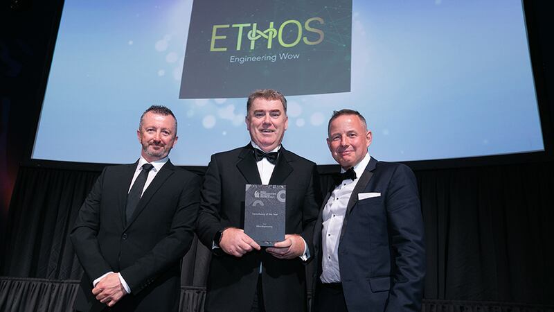 Anthony Greene, Awards Judge, presents the Consultancy of the Year award to John Coroner & Greg Hayden, Ethos Engineering.