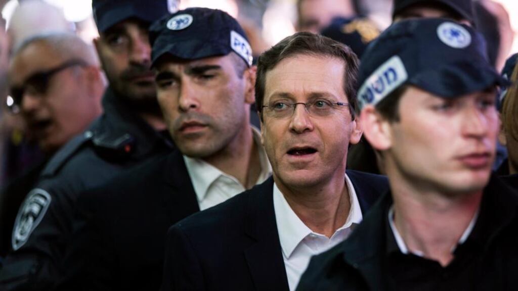 Isaac Herzog, co-leader of the centre-left Zionist Union, during a campaign stop at a fruit and vegetable market in Tel Aviv on Thursday. Polls suggest the Israeli electorate is getting used to the idea of him as prime minister. Photograph: Baz Ratner/Reuters