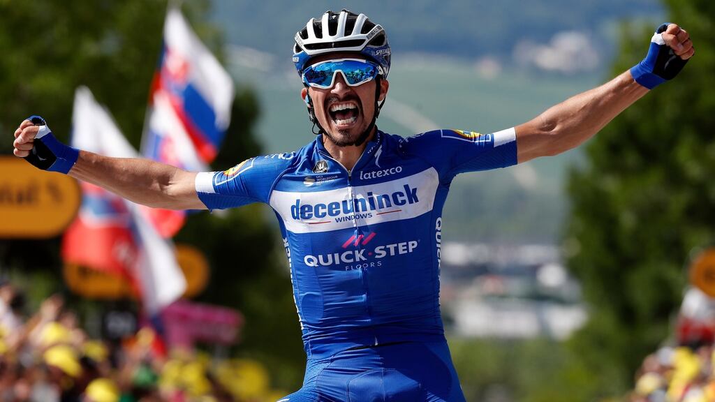 France’s Julian Alaphilippe of team Deceuninck Quick Step celebrates winning stage three of the Tour de France between Binche and Épernay. Photograph: EPA/Guillaume Horcajuelo
