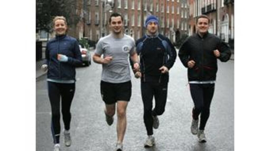 Trainer Karl Henry (second from left) with Boston-bound marathon
runners with asthma, Allison Drummond, Darren McCarthy and Gareth
Dixon.