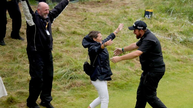 Shane Lowry celebrates with his parents Bridget and Brendan after winning the British Open at Portrush. Photo: Oisin Keniry/Inpho