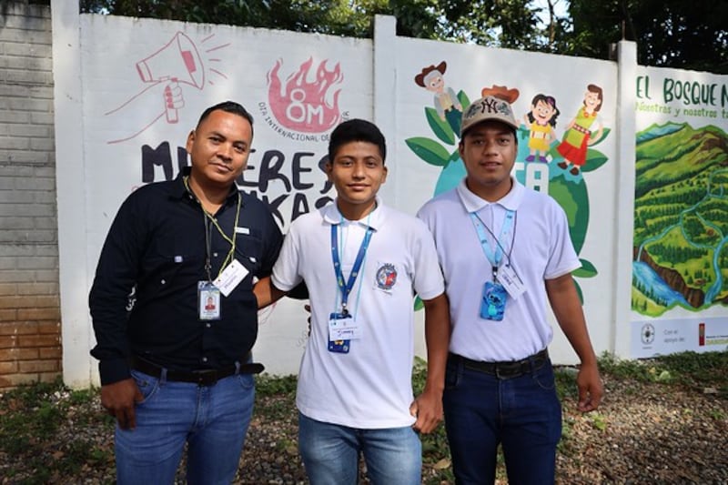 Misrain de La Rosa Perez, a lecturer,  students Obed Vasque (20) and Jimmy Revolorio (28). Photograph: Hannah McCarthy