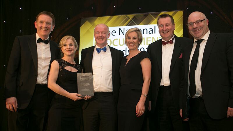 Angelyn Rowan, Partner Construction & Projects, Eversheds Sutherland presents the Best Cross Function Collaboration Project of the Year award the Pfizer team