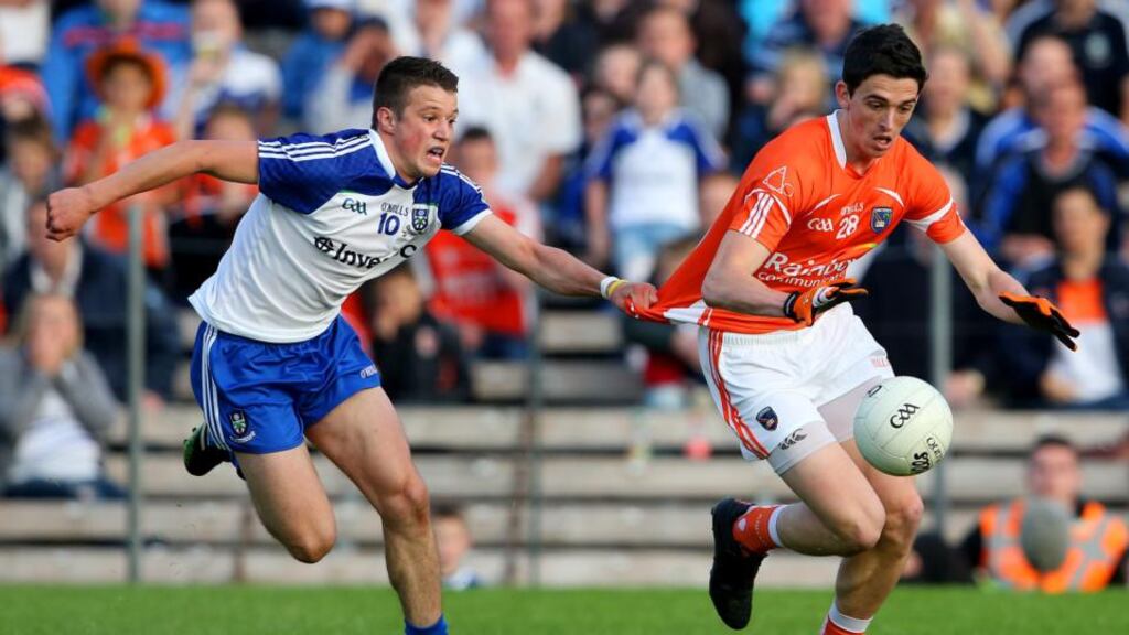 Armagh’s Rory Grugan is caught by Ryan Wylie of Monaghan during the final moments of the Ulster semi-final at St Tiernach’s Park, Clones, Co Monaghan. Photograph: Inpho