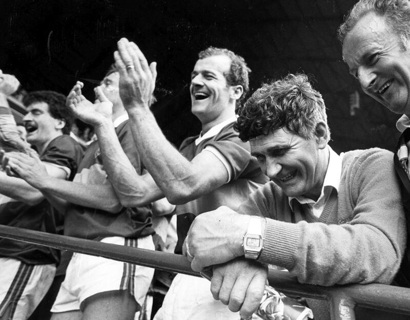 Jack O'Shea claps as Mick O'Dwyer smiles on after the 1985 All-Ireland final win over Dublin. Photograph: Billy Stickland/Inpho