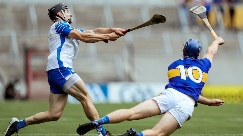 Waterford’s Jamie Barron is challenged by Jason Forde of Tipperary during the All-Ireland hurling quarter-final at Páirc Uí Chaoimh. Photograph: Brian Reilly-Troy/Inpho