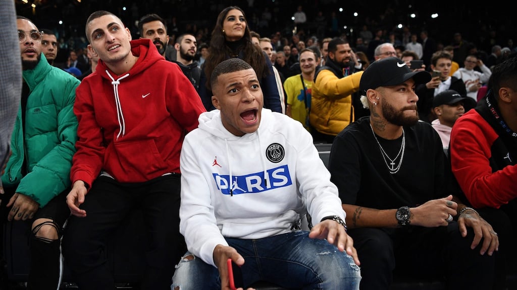 Kylian Mballe watching the  Milwaukee Bucks against the Charlotte Hornets in Paris. Photograph: Franck Fife/Getty/AFP