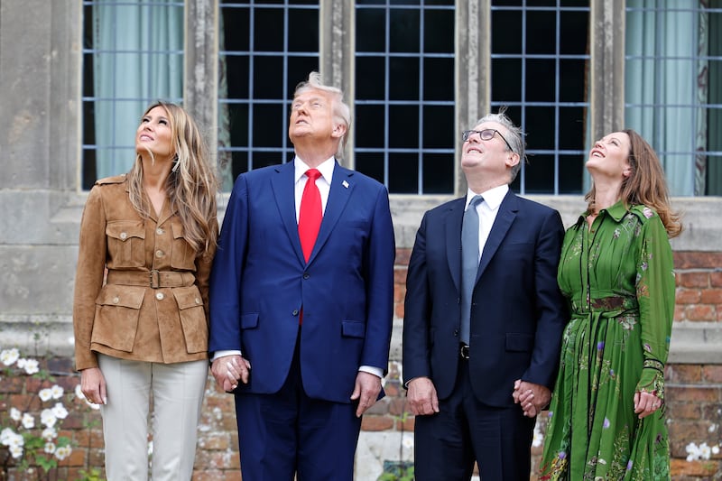 US first lady Melania Trump, US president Donald Trump, UK prime minister Keir Starmer and Lady Victoria Starmer watch the Red Devils parachute display team at Chequers. Photograph: Anna Moneymaker/Getty Images
