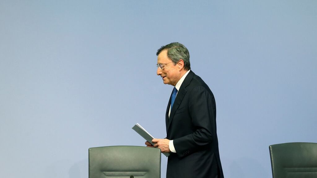 Exiting the stage: Mario Draghi leaves his final news conference at the ECB on Thursday. Photograph: Reuters
