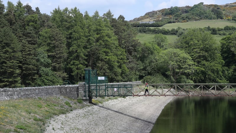 Assistant inspector Ger Goodwin checks water levels in the upper lake of Bohernabreena reservoir in Dublin. Photograph: PA