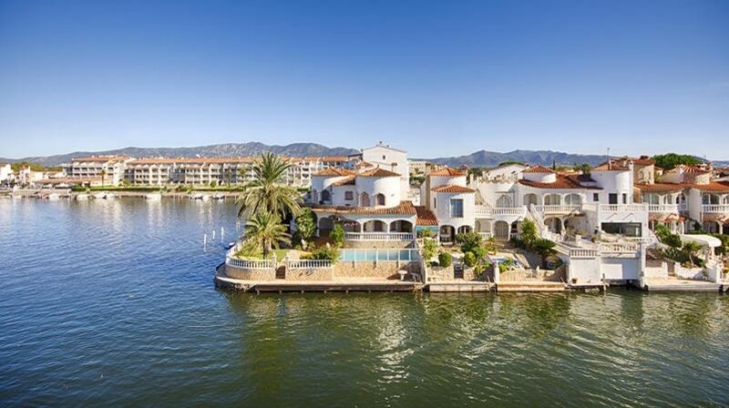 This second-floor apartment has water and mountain views.