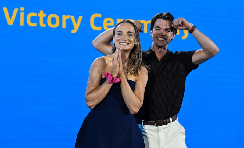 Mags Cremen and Fintan McCarthy celebrate winning gold at the 2025 World Rowing Championships, in Shanghai, China. Photograph: INPHO/ Detlev Seyb